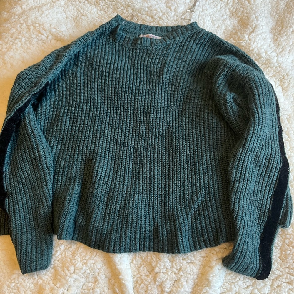 vintage havana green sweater with subtle leopard print and black striped sleeve